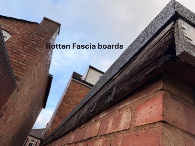 Rotten fascia boards at roof level